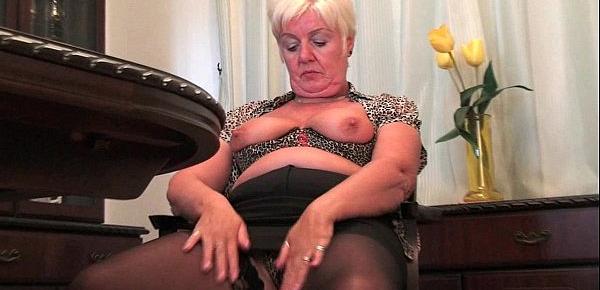  British and full figured granny Sandie masturbates with a dildo